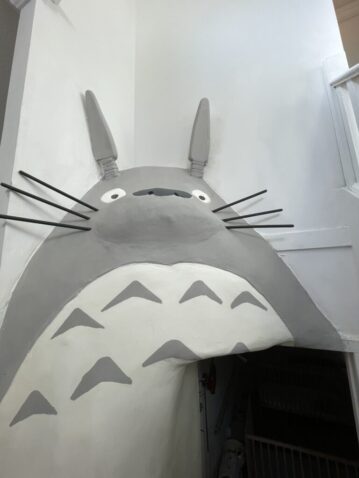 Life size Totoro. Plywood and wire frame. Sculpted with Hydrocal White angle grinder + sand flaps